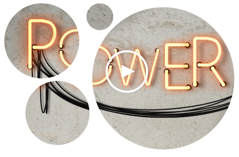 A lit up neon sign shaped as the word “power.”