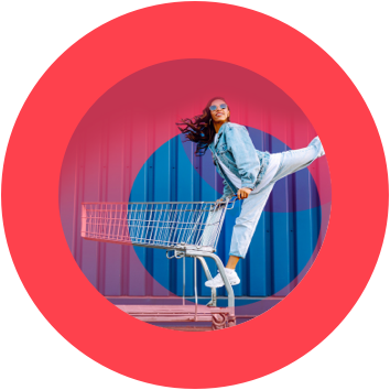 a woman pushing a shopping cart representing Retail Media Networks (RMN).