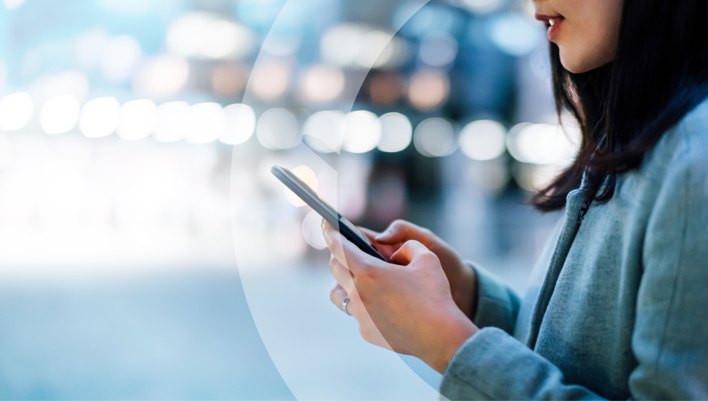 Woman in public on mobile phone