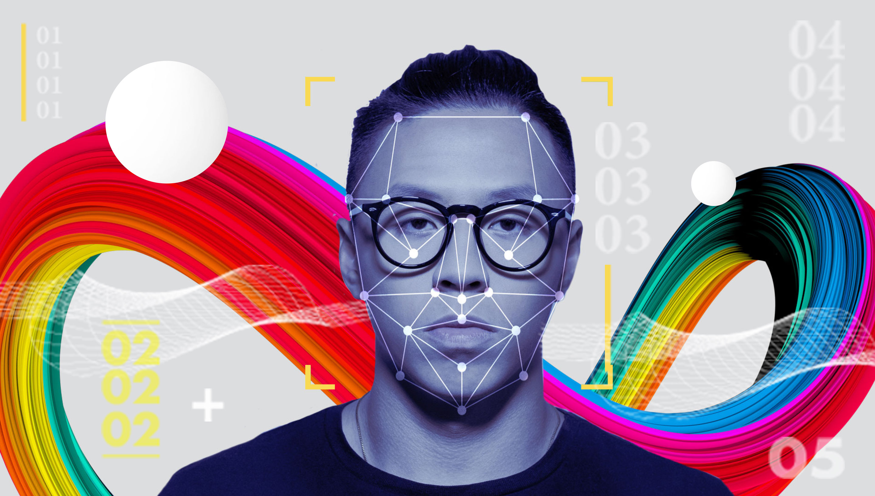 Portrait of man with glasses in front of colorful abstract background