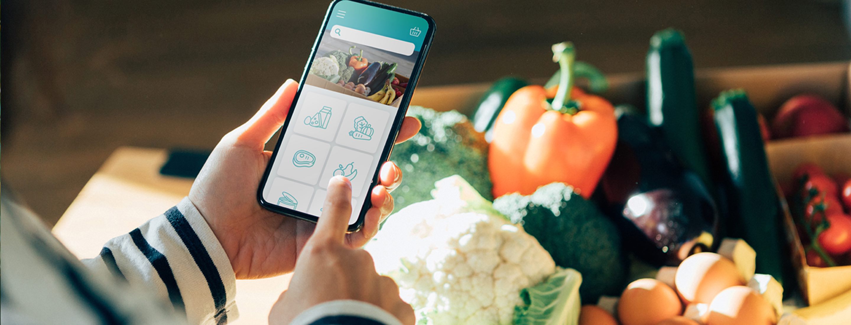 Shopper chooses groceries from an app.