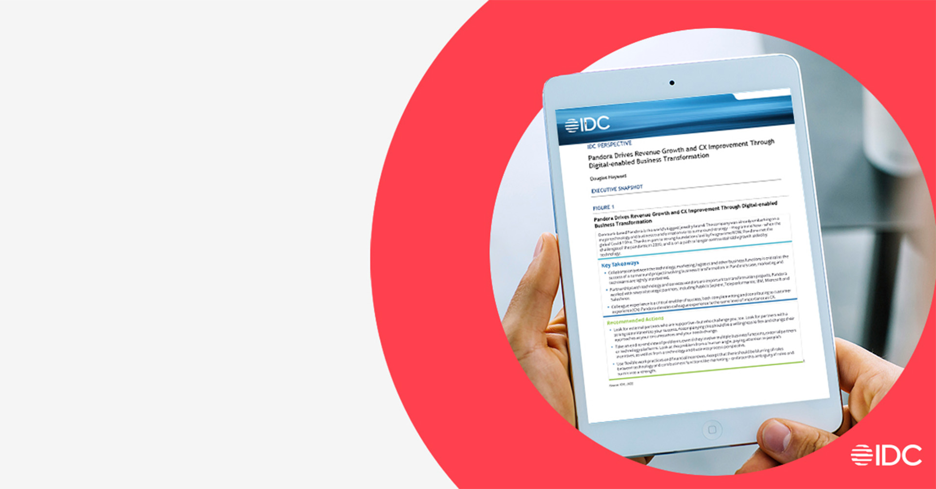 Hands holding an e-reader with an IDC logo on top and an IDC case report on the screen