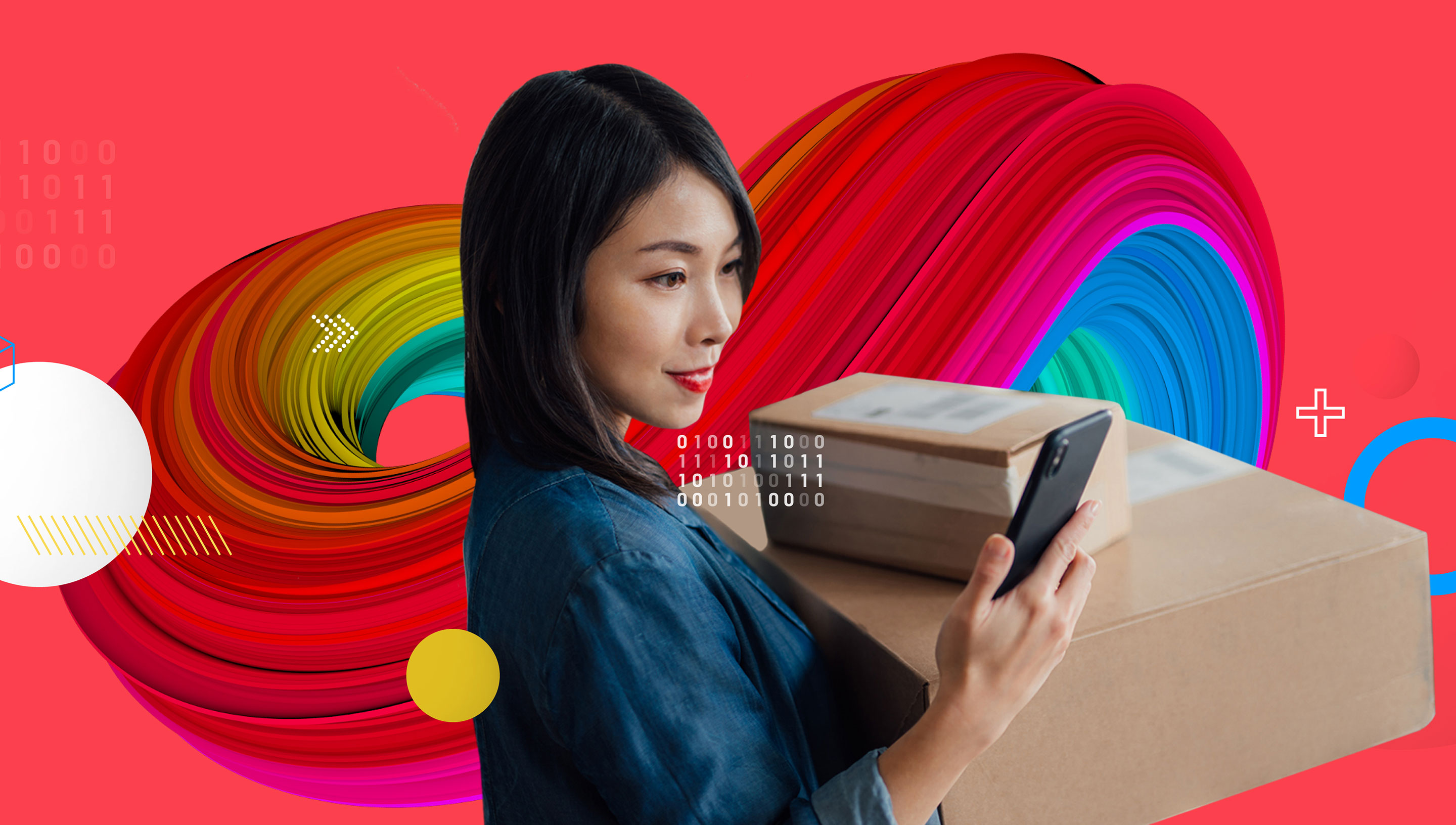 Female customer carries shipping packages in one arm, while looking at smartphone in other hand
