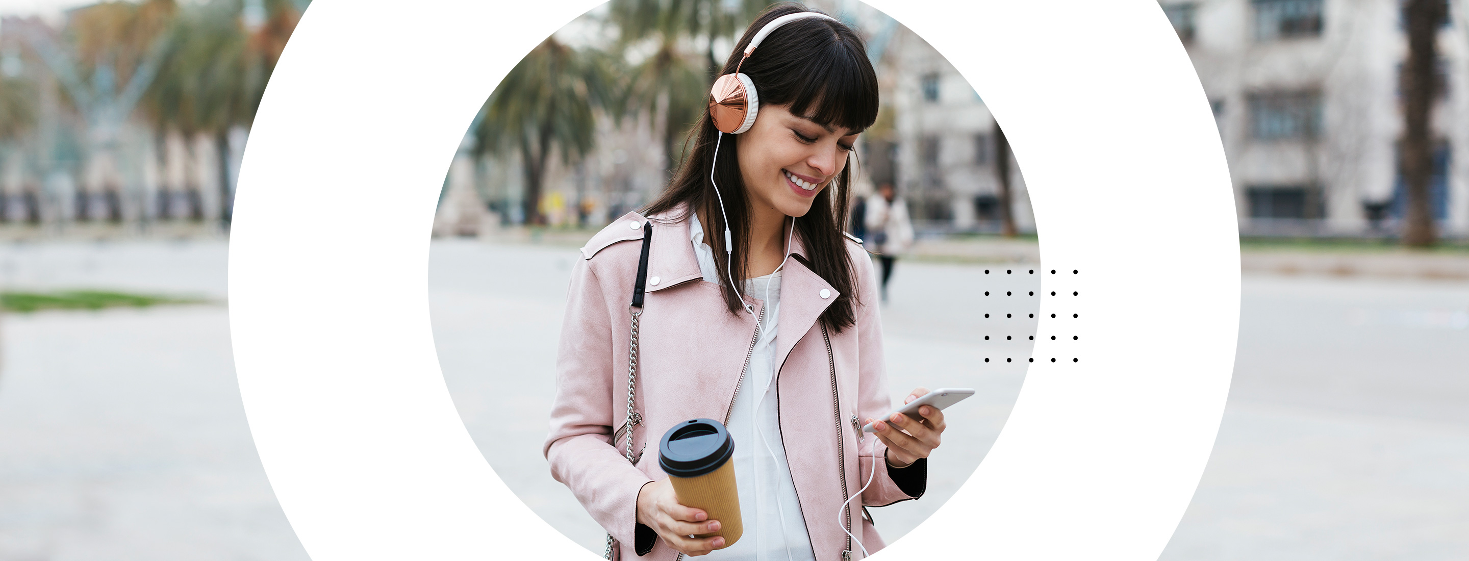 Millenial woman with phone, coffee and headphones