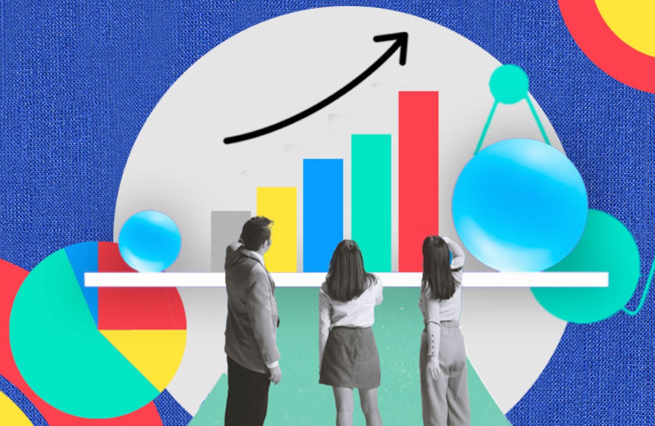 Employees assessing a bar chart