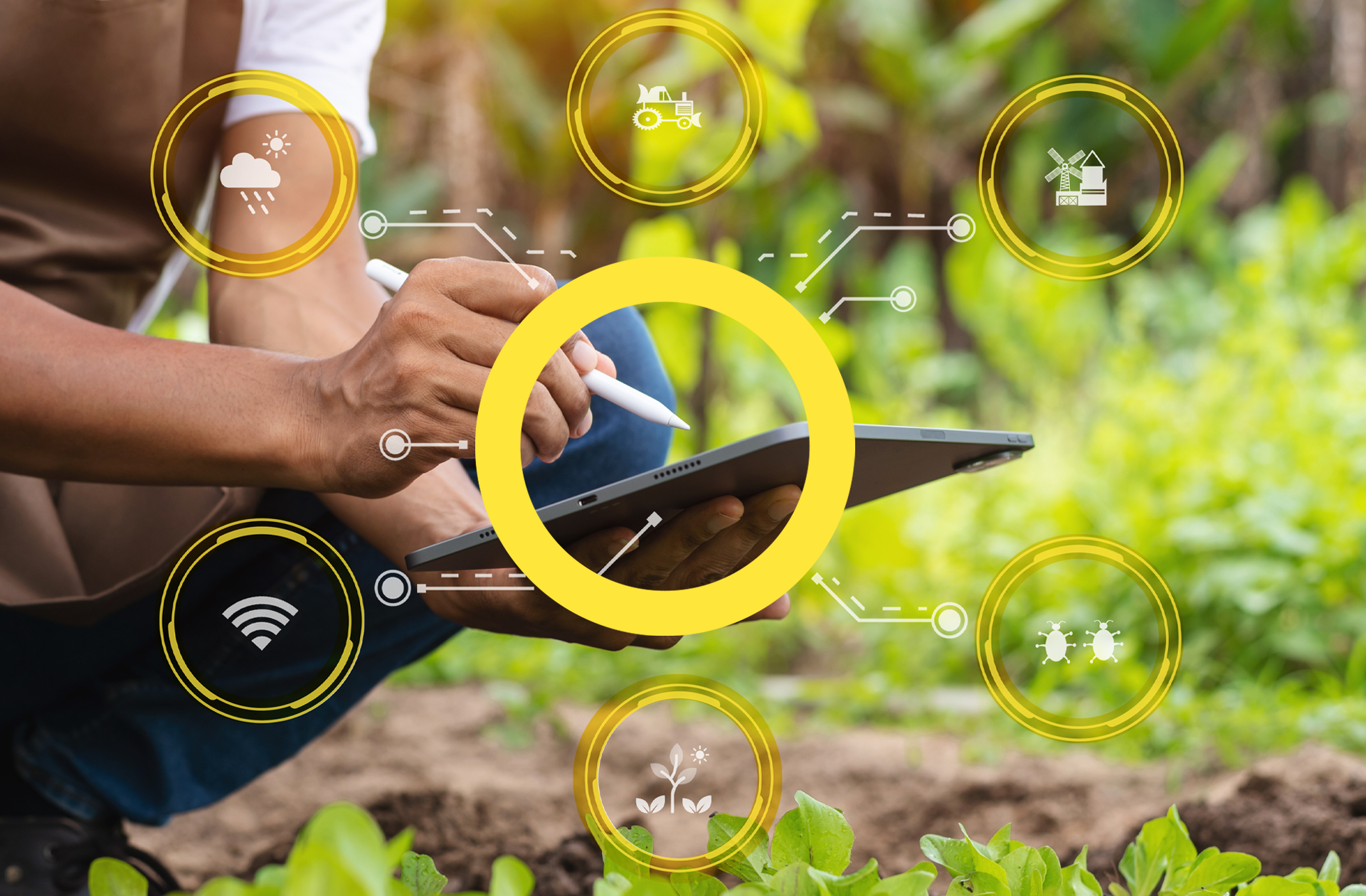App icons overlay an image of a pair of hands holding a tablet and digital pen