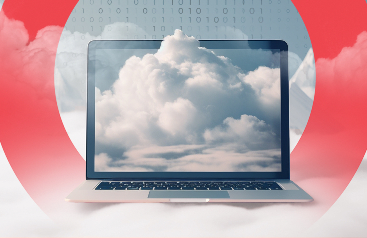 open laptop with clouds on the screen and in the background
