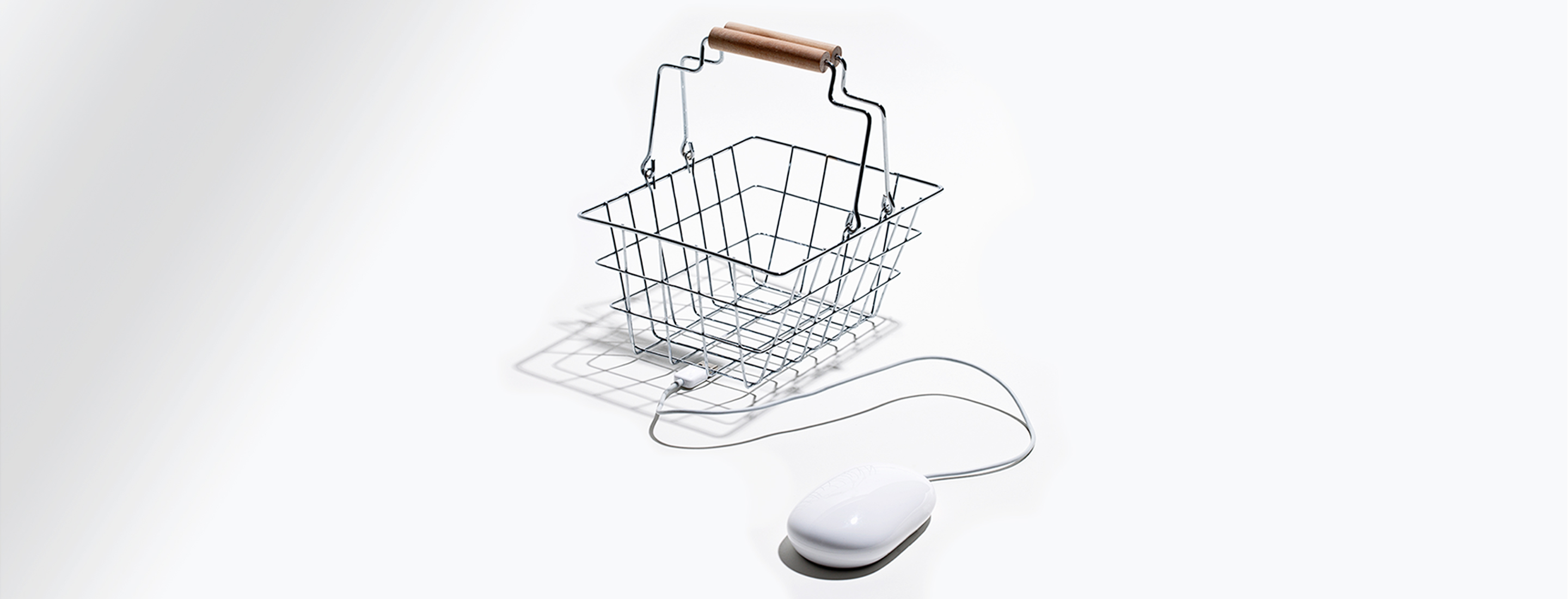 abstract image of mini shopping basket with USB cord connected