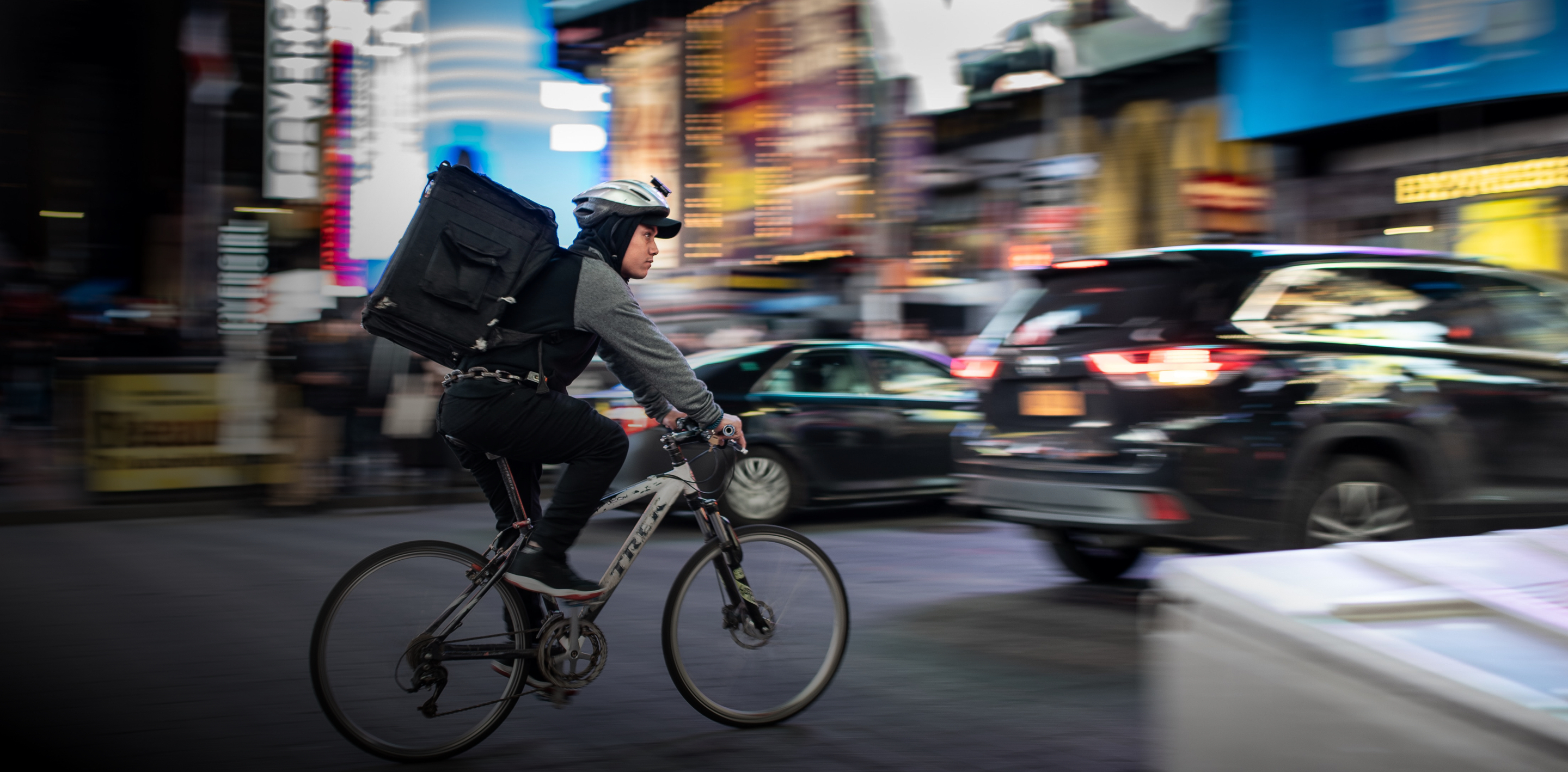 Delivery courier on a bike. 