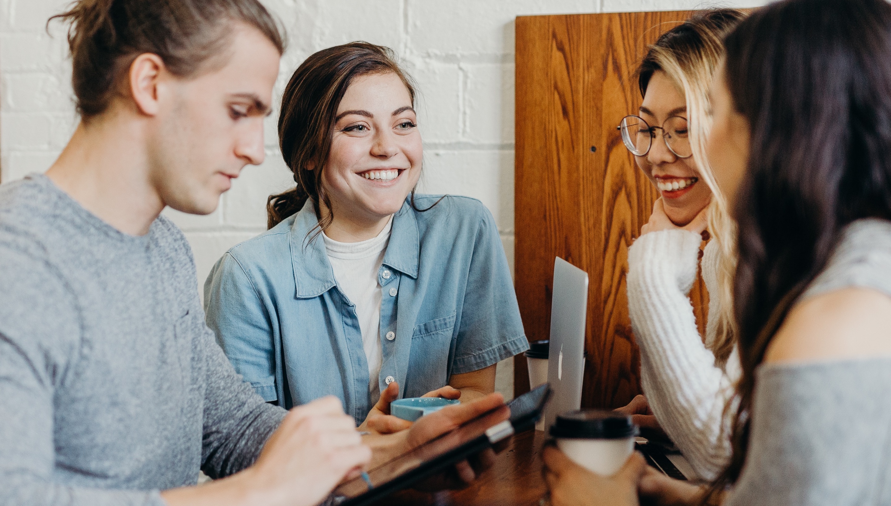 Gen Z talking and having coffee