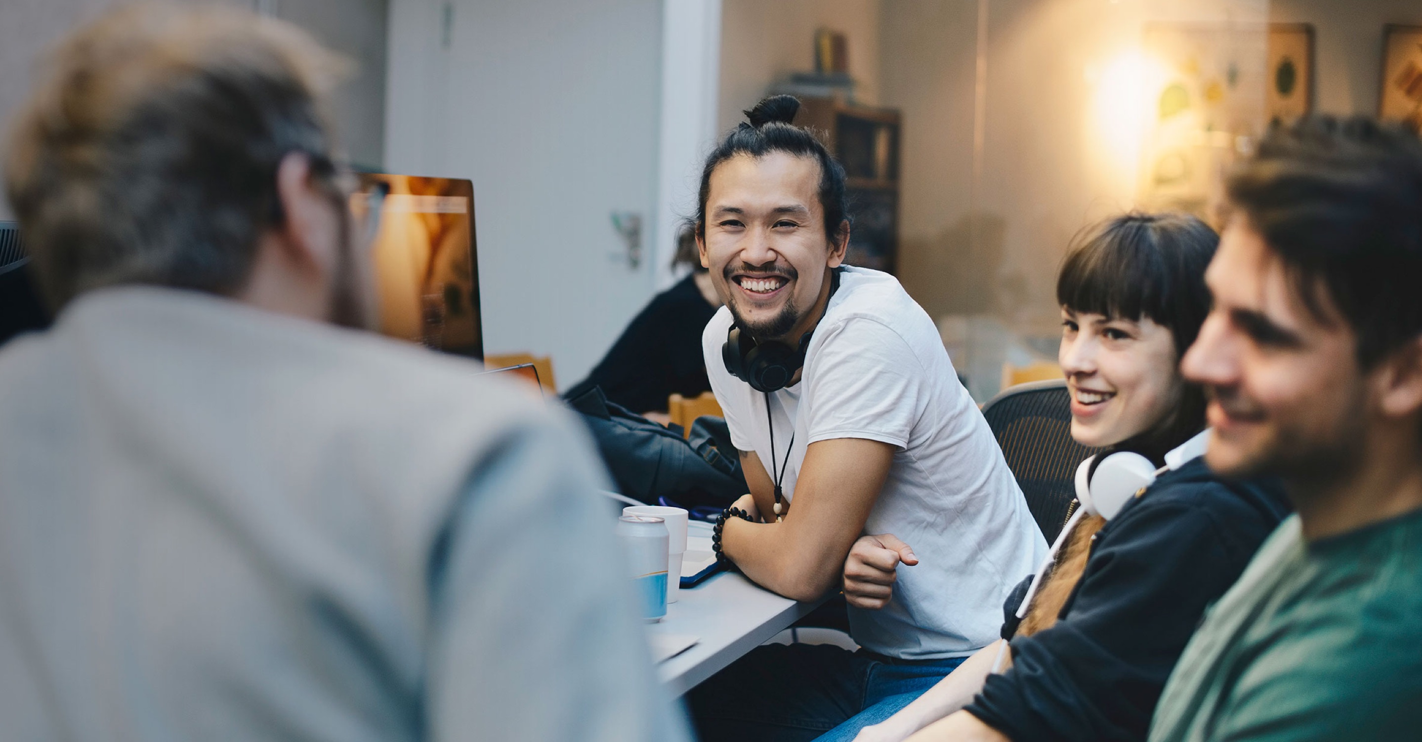 Group of young professionals in an office setting