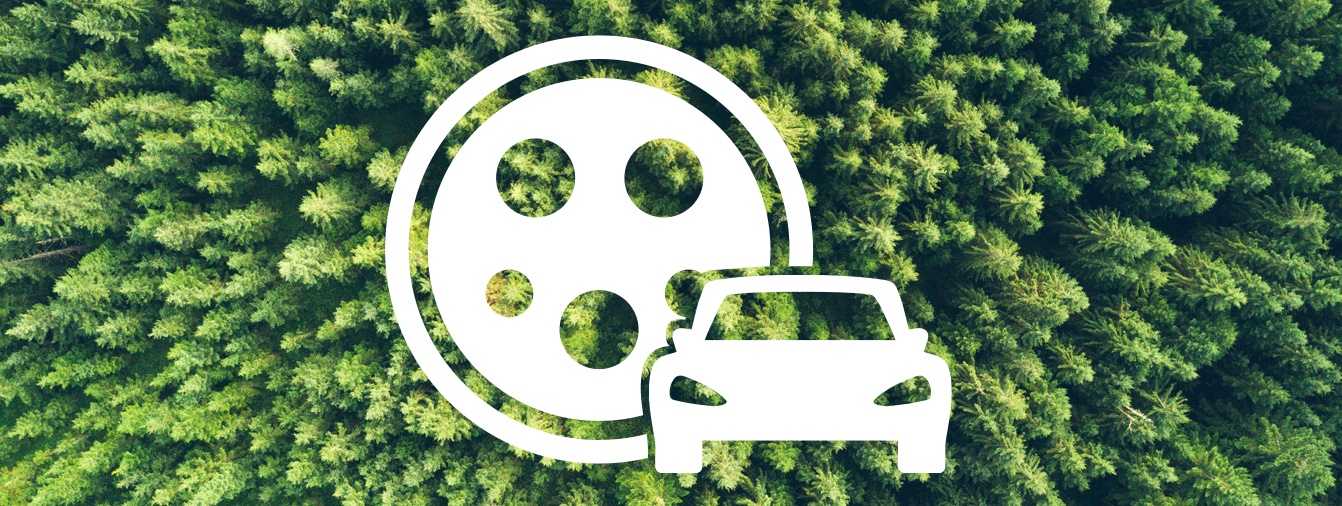 Electric car ilustration on top of a forrest of trees.