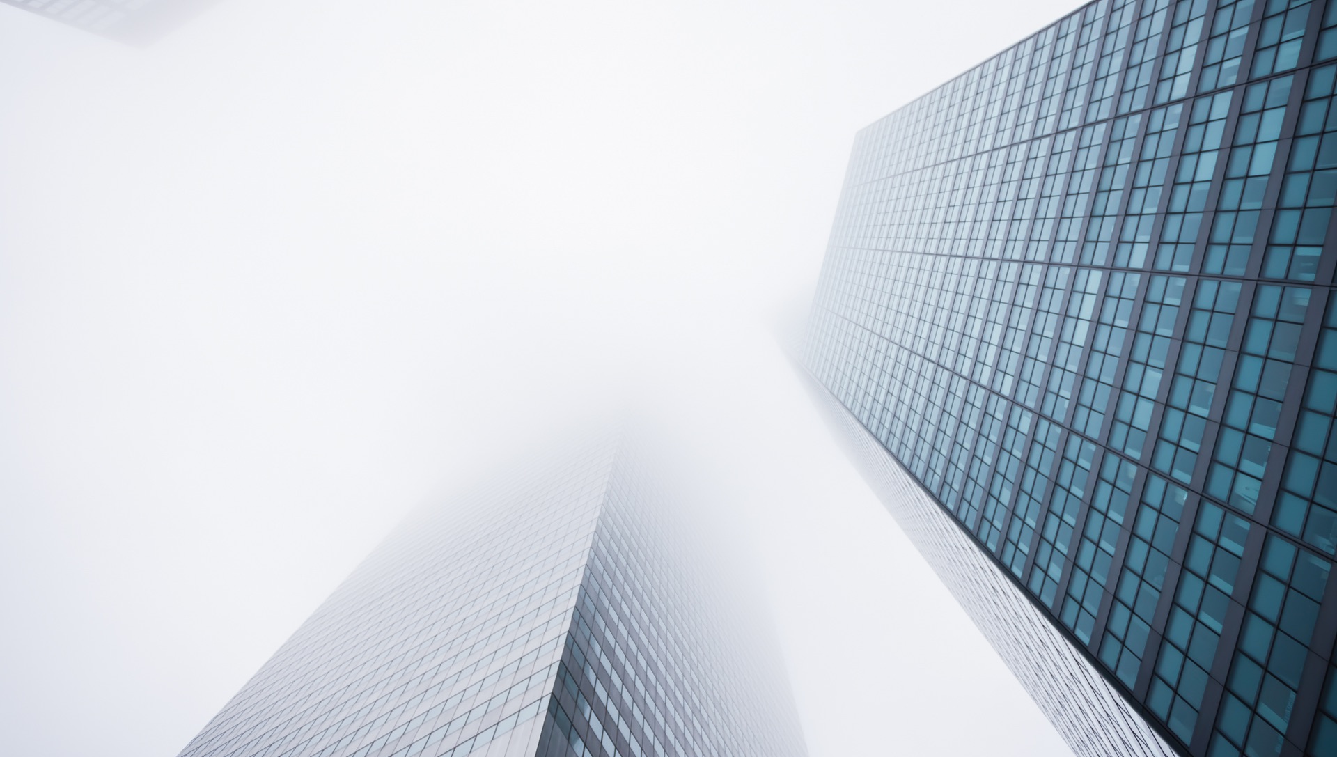 Looking up at skyscrapers