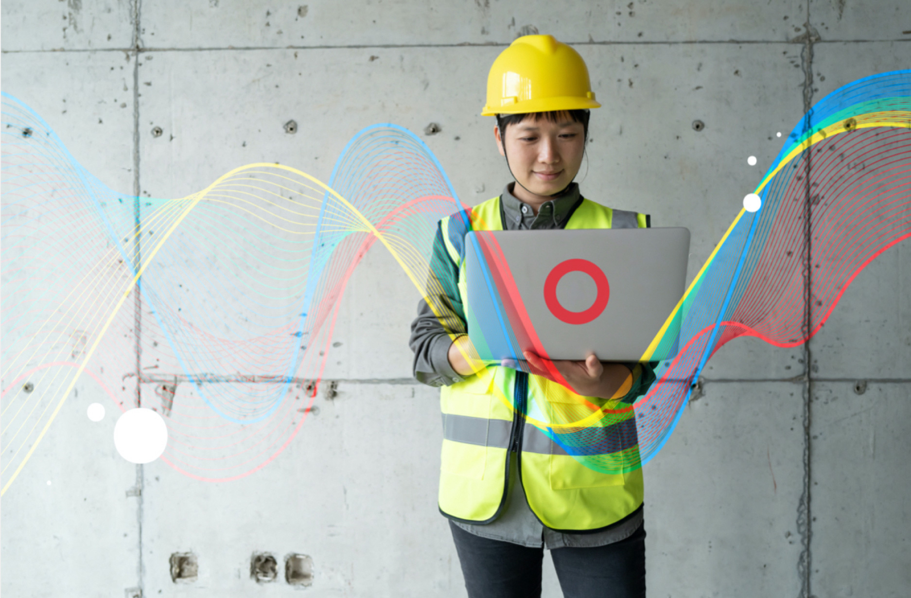 person in construction hat holding laptop with streams of data flowing through it