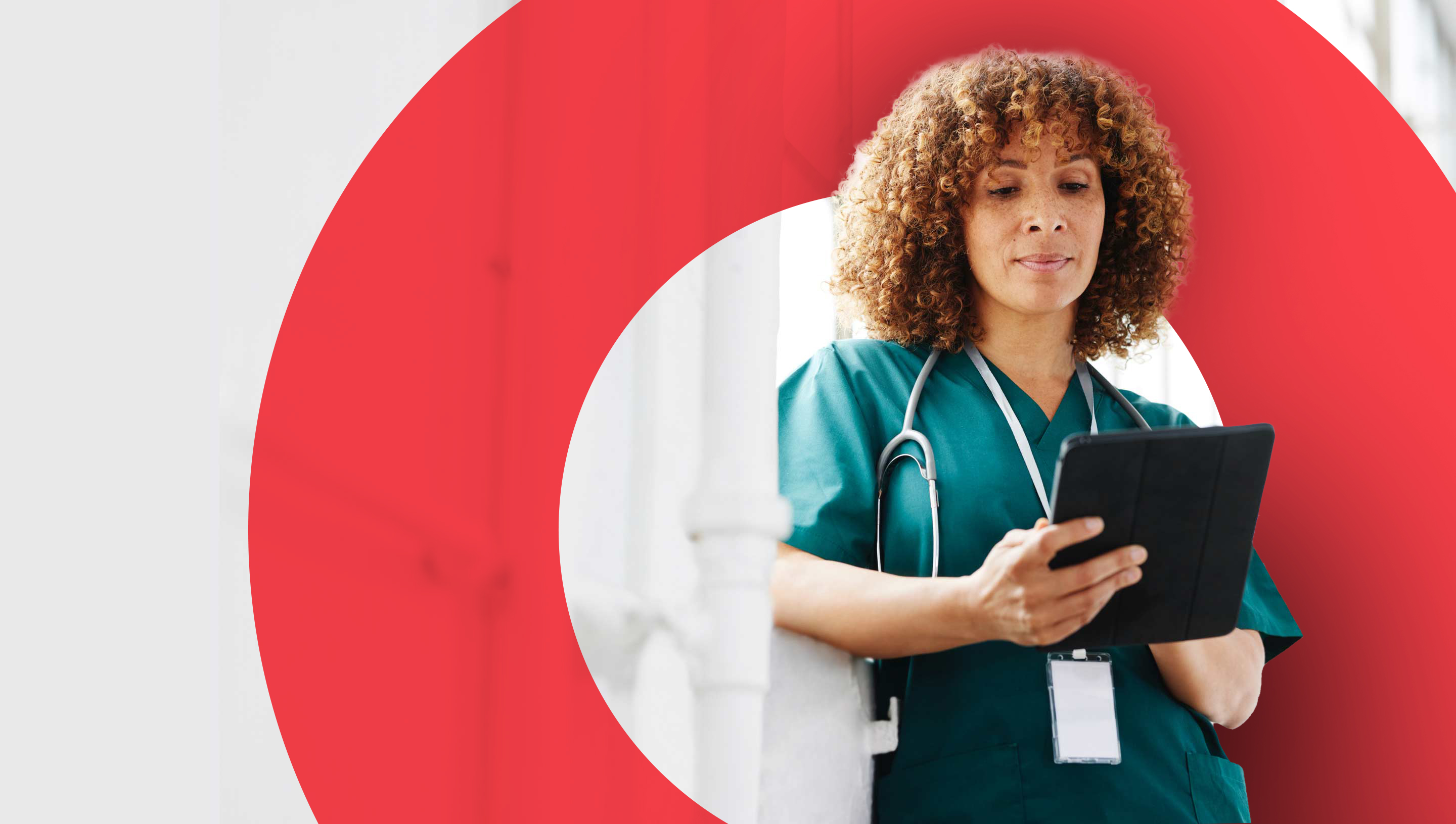 Healthcare professional using a tablet during a consultation