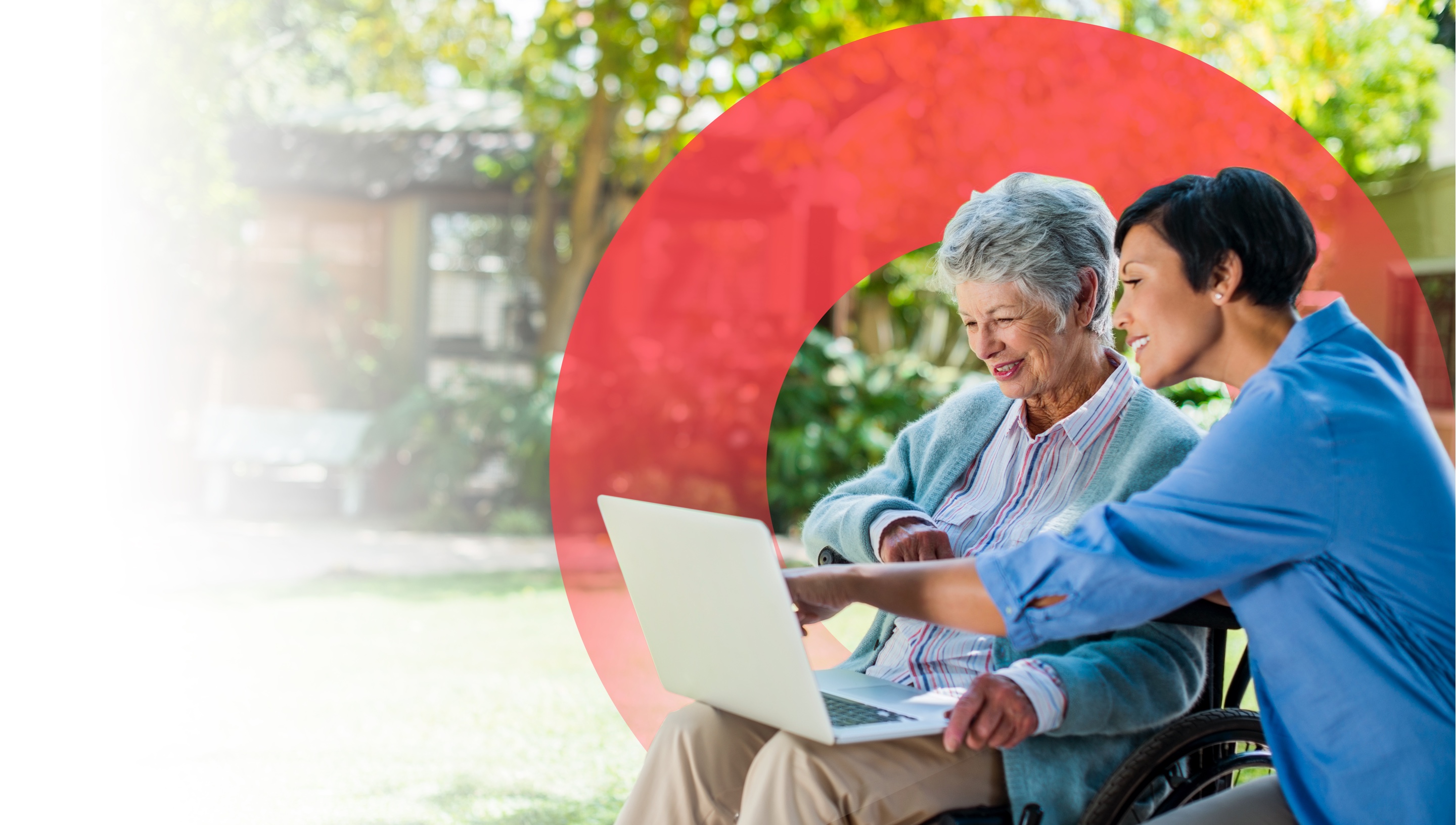 Elderly disabled lady with her caregiver