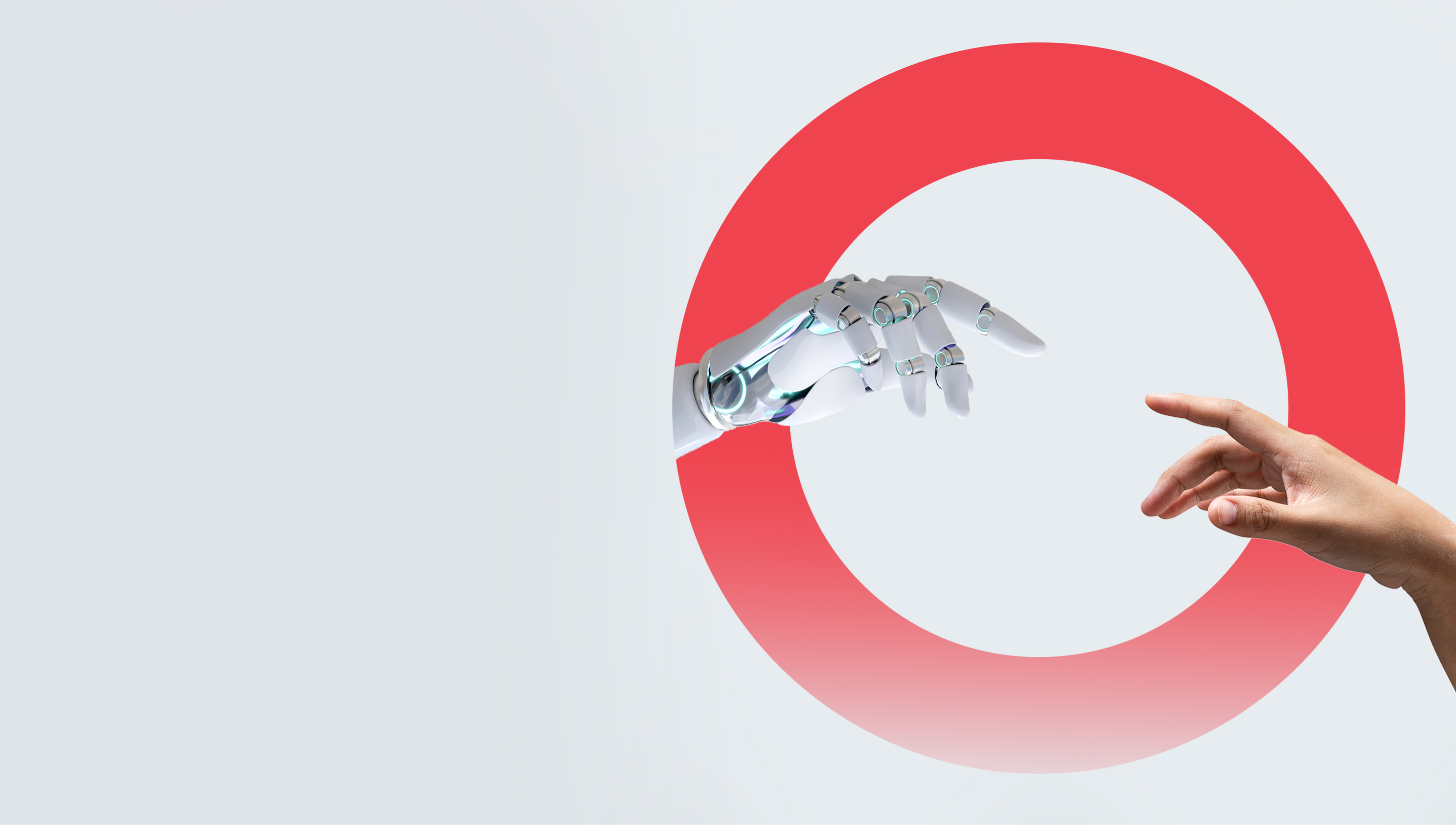 A futuristic, robotic hand reaching out to touch a human hand.