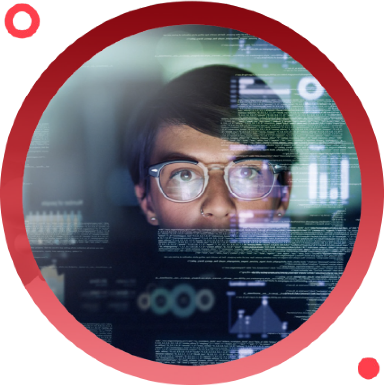 reflection of a person’s face in front of a screen running code