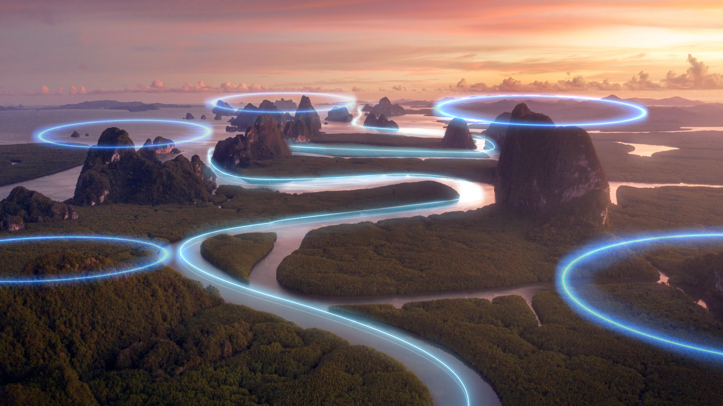 A mountainous landscape shown from above, with blue light weaving through the valleys