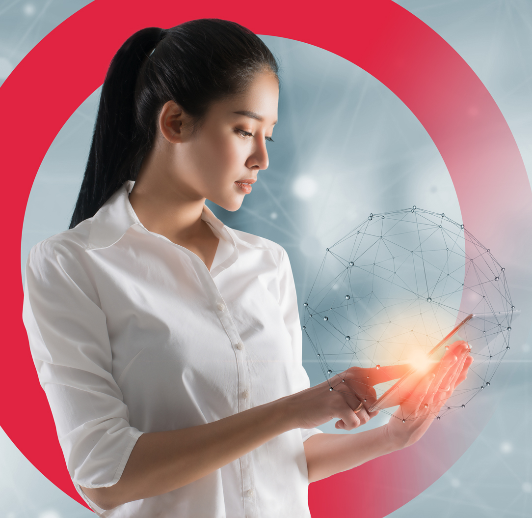 Woman standing holding and pointing to tablet with data points in background