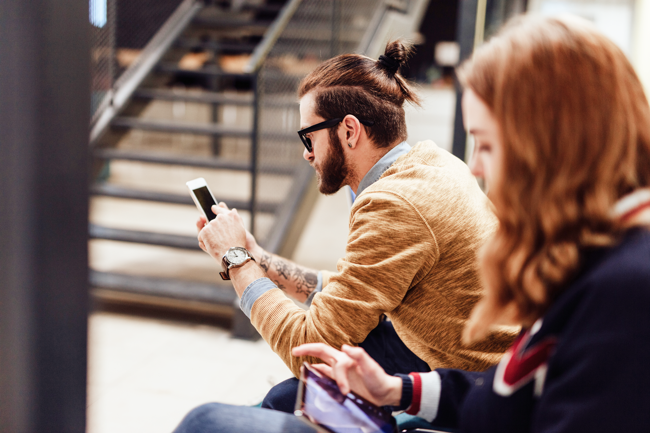 Photo of a professional reviewing a financial dashboard on a tablet, representing personalized wealth-management technology.